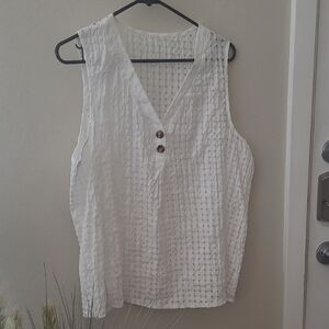 Elegant White Textured Sleeveless Blouse